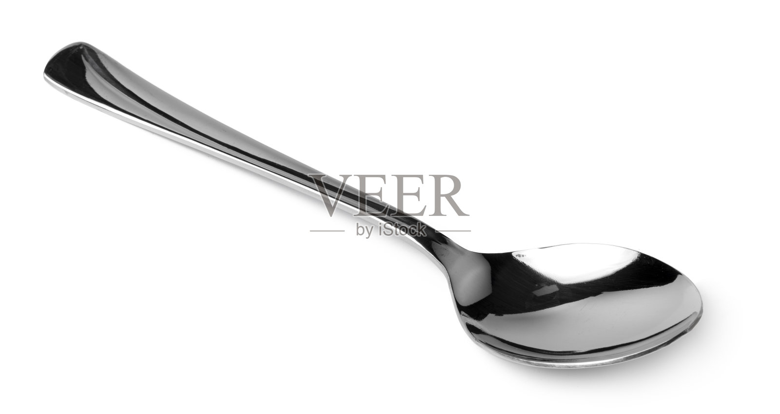 银勺孤立在白色背景近距离照片摄影图片