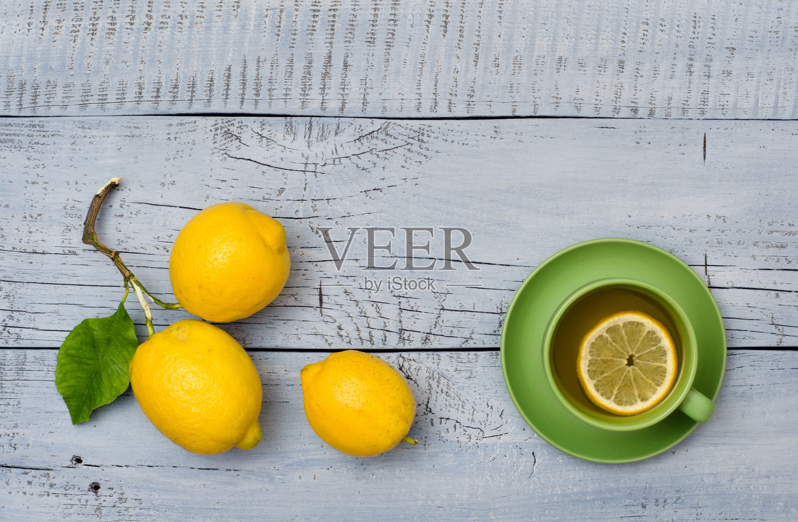 成熟的柠檬和一杯茶照片摄影图片