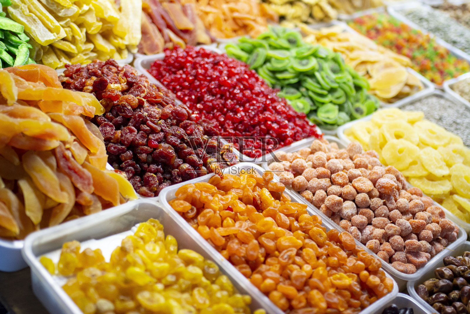 市场上的干果、坚果(开心果)和蜜饯照片摄影图片