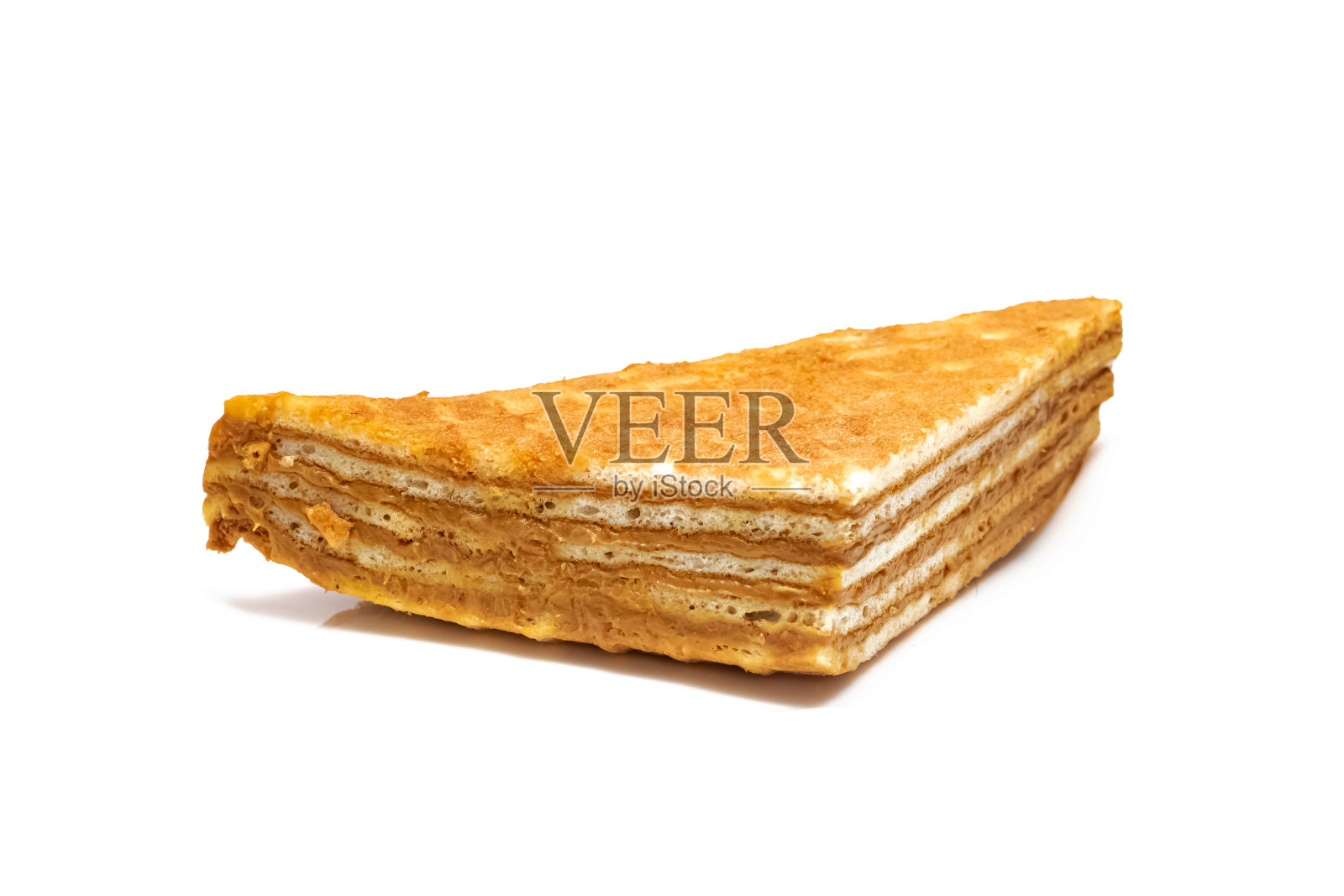 华夫饼与炼乳隔离在白色背景照片摄影图片