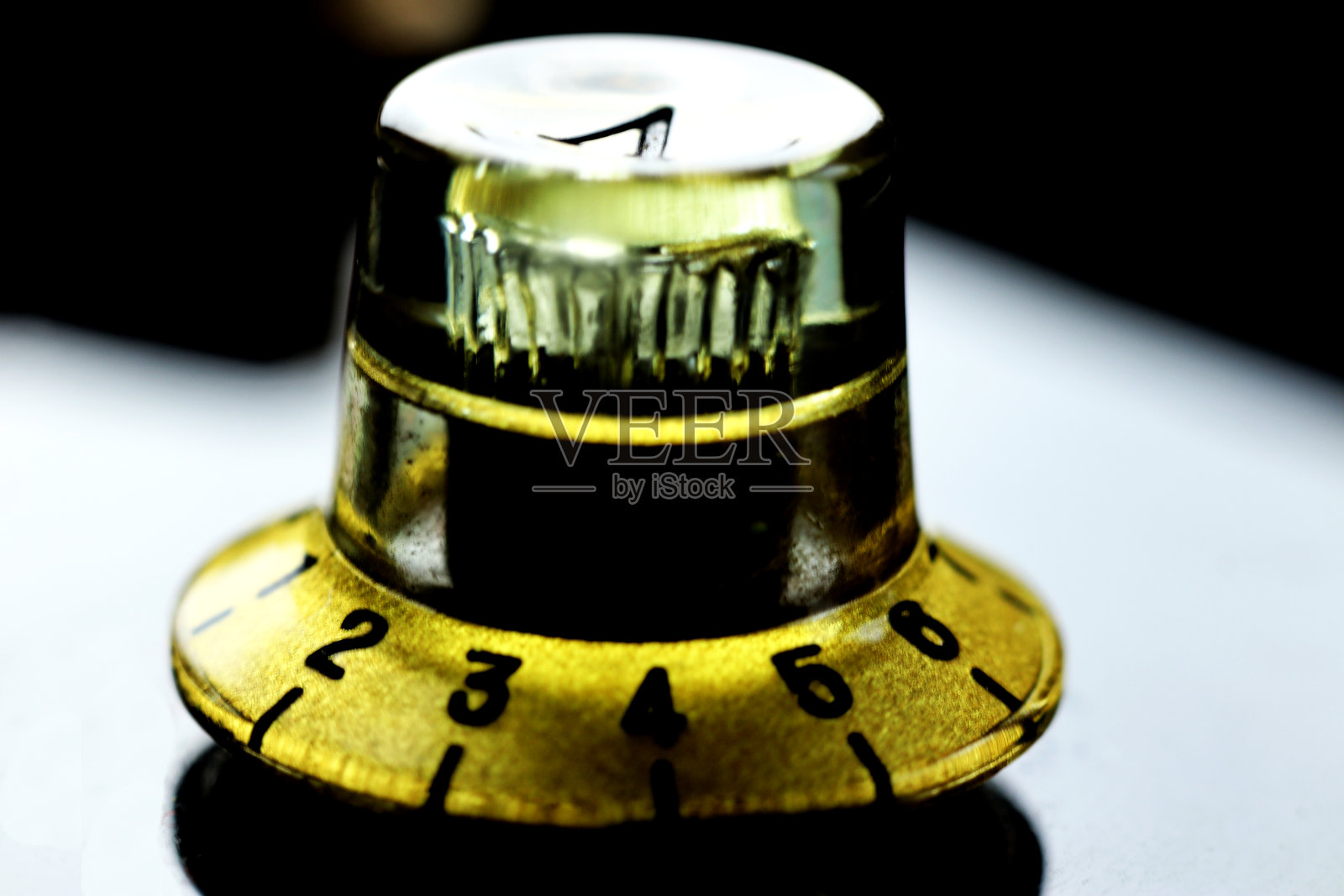 金色电吉他音量旋钮-宏观照片摄影图片