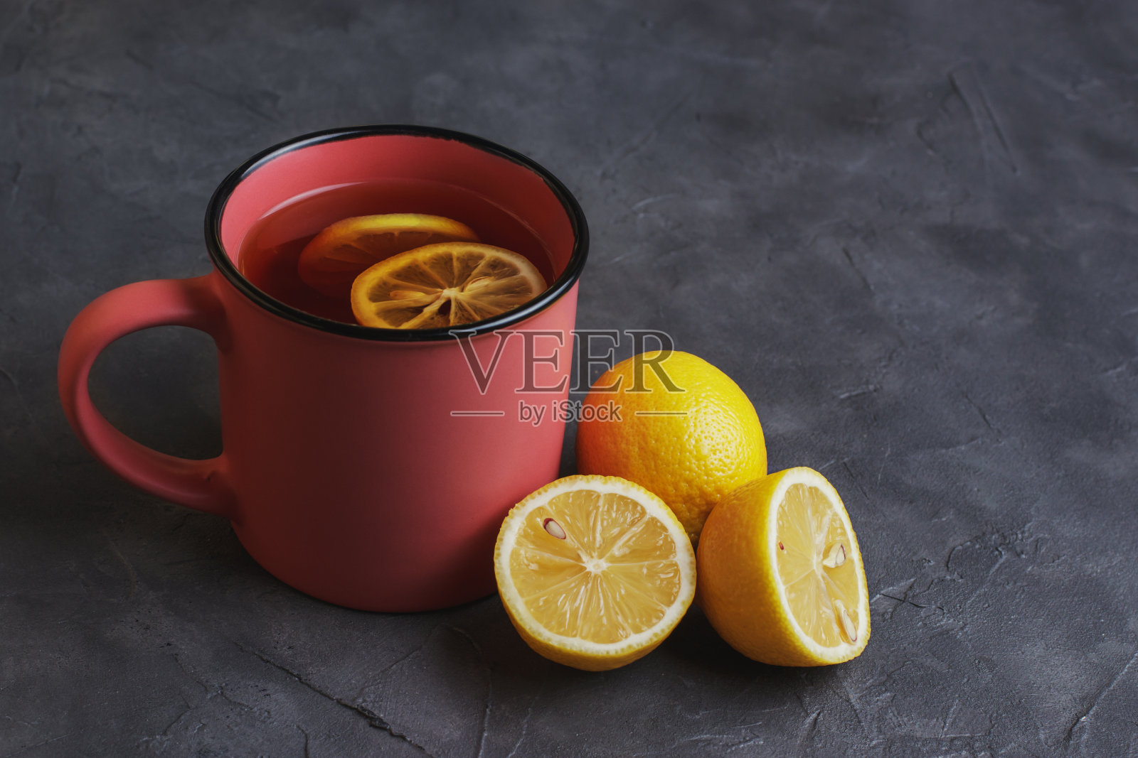 柠檬和蜂蜜的茶。照片摄影图片