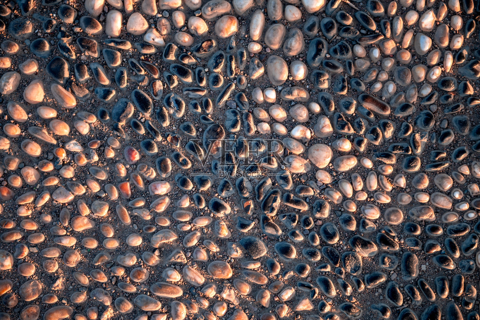 人行道上小鹅卵石的图案照片摄影图片