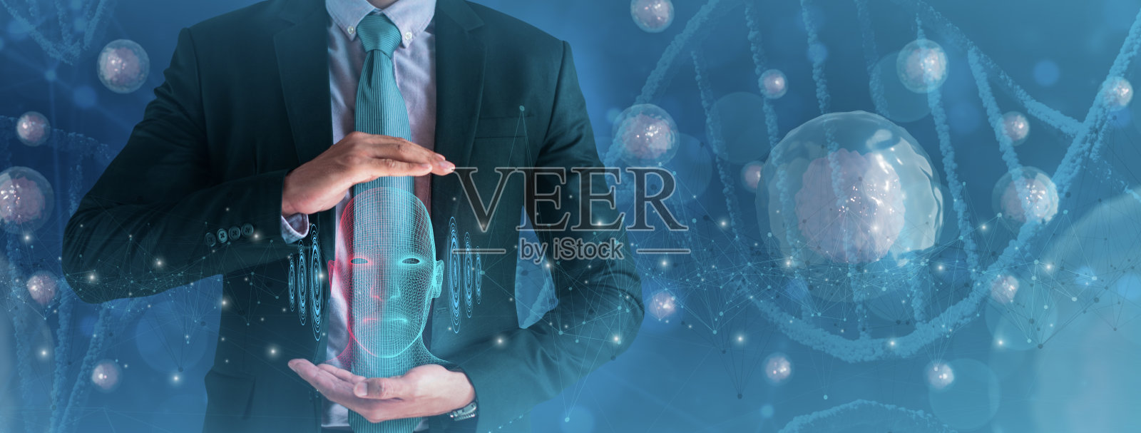 商人抱着未来人类头部模型线框，概念科学人类发展，健康，DNA分析，寻找人才，力量，性格的人，现代科技，人工智能照片摄影图片