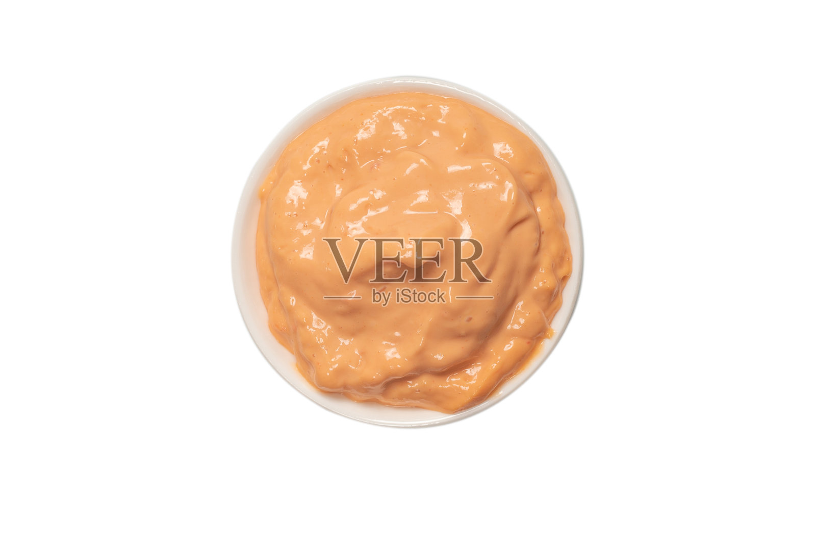 酱汁在碗里孤立白色。照片摄影图片