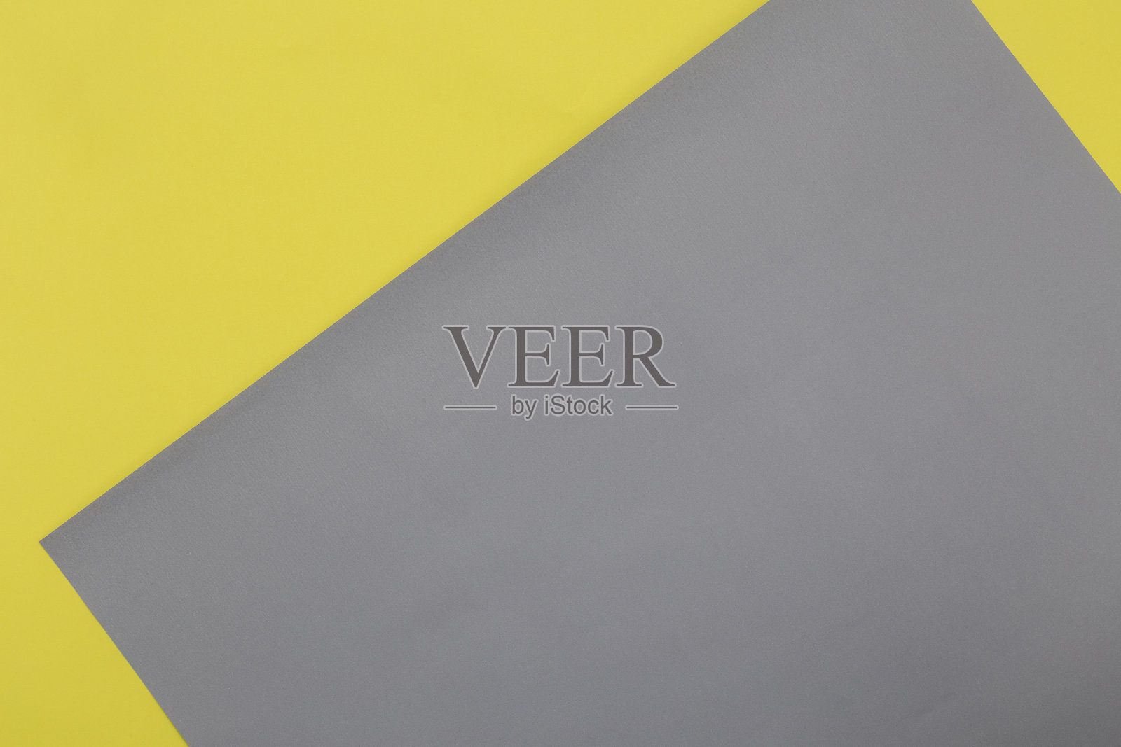 照亮黄色和终极灰色粉彩纸纹理背景，几何平面lay背景照片摄影图片