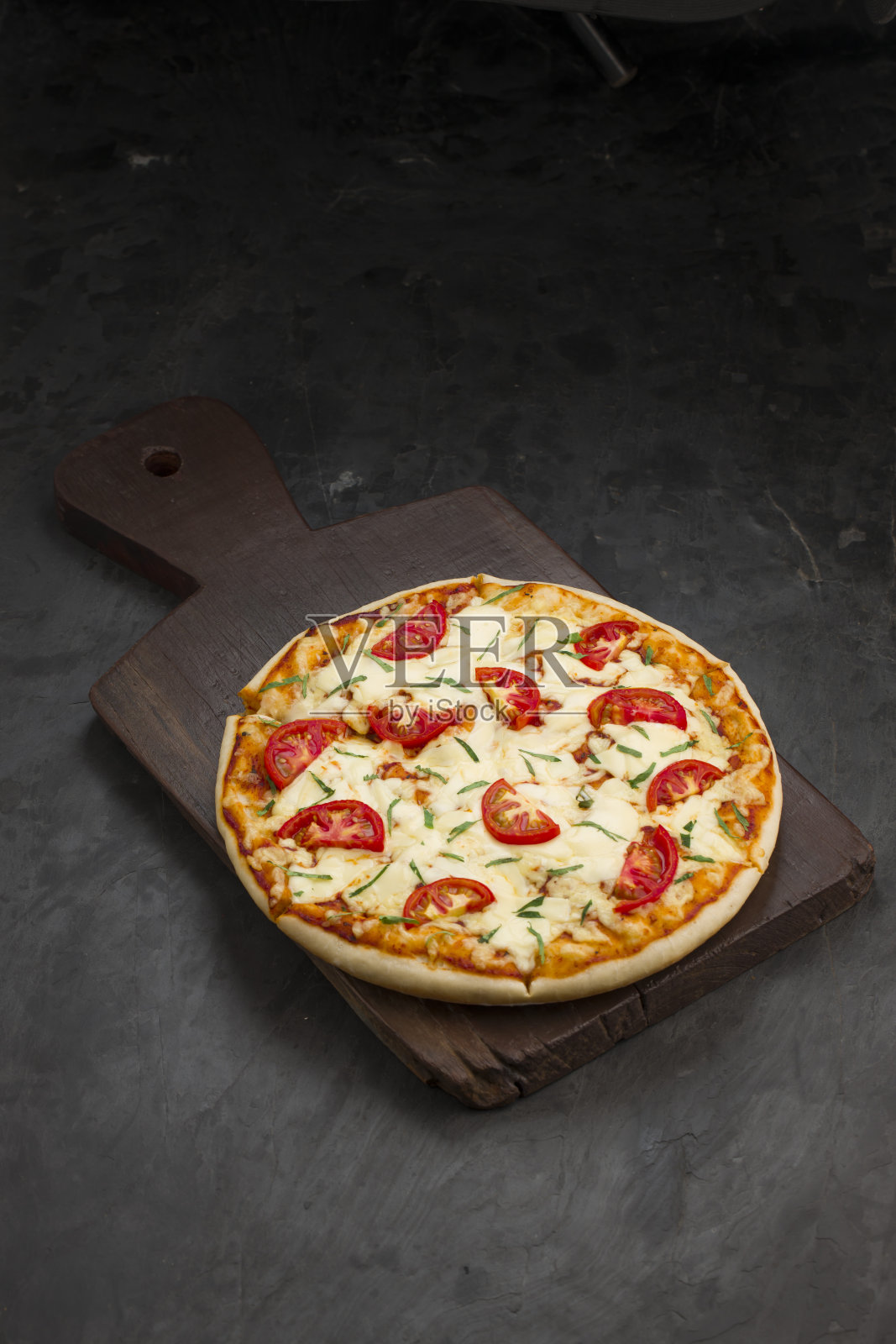 桌上披萨的特写镜头照片摄影图片