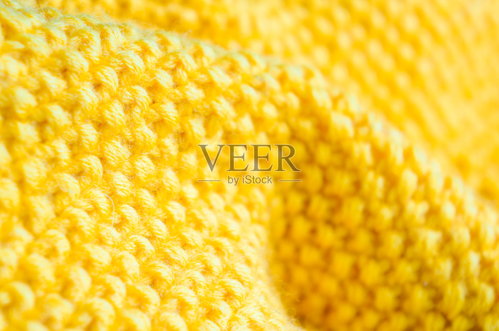 针织毛衣的纹理，用于毛衣的背景，纺织品，表面的纹理。照片摄影图片