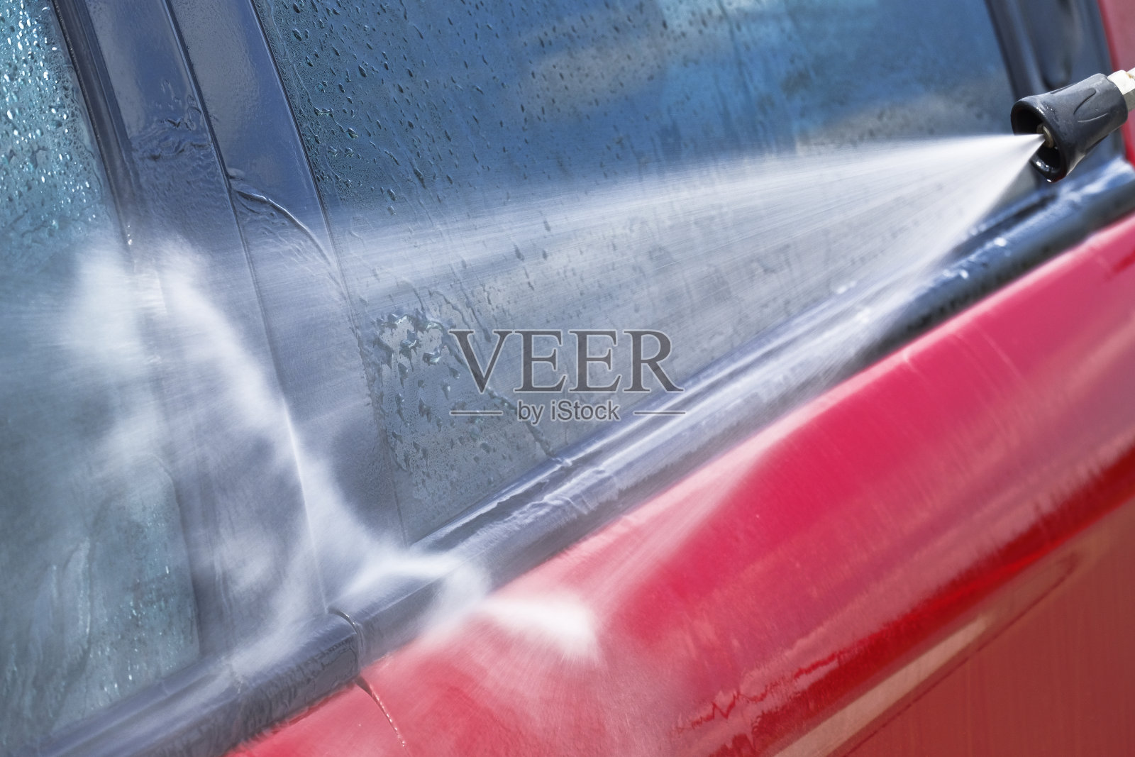 用高压洗衣机洗车照片摄影图片