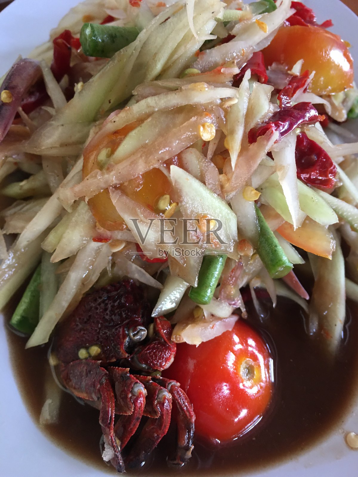 木瓜色拉配酸菜蟹照片摄影图片