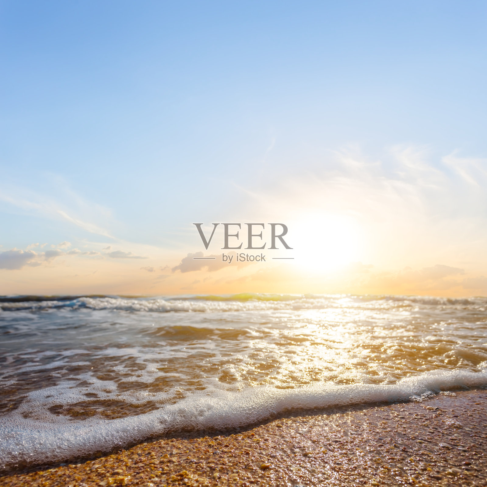 海滩上的日落照片摄影图片