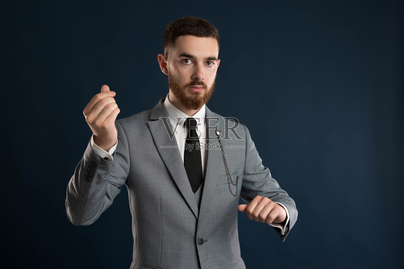 年轻的企业家说时间就是金钱照片摄影图片