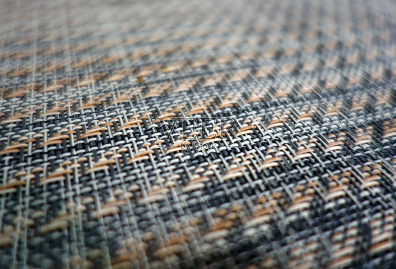 带有模糊效果的塑料覆盖图案。照片摄影图片