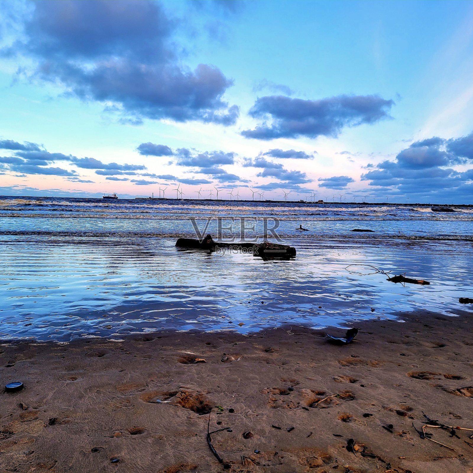 海滩的黄昏照片摄影图片