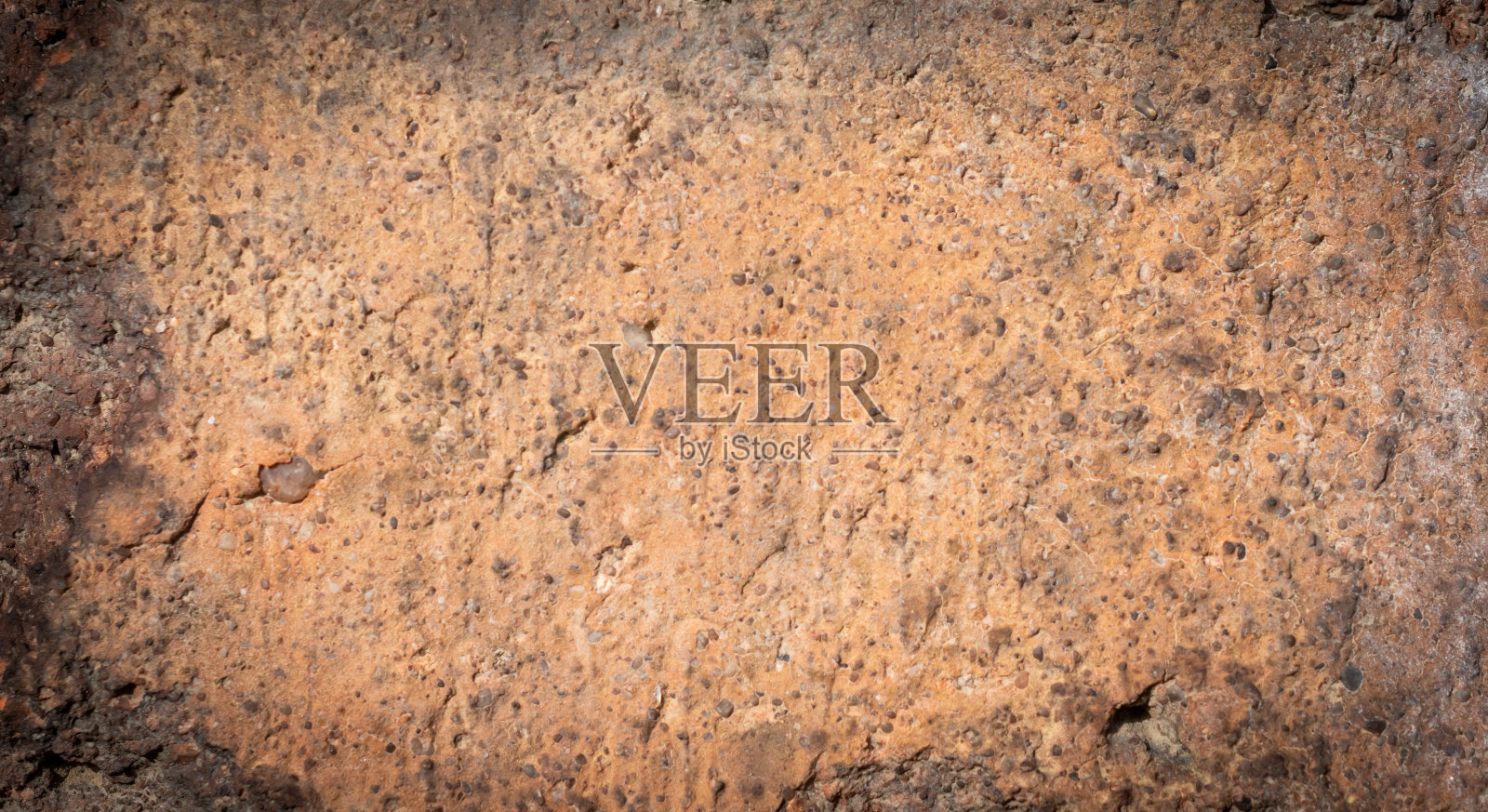 微距照片的橙色砖与可见的纹理。背景照片摄影图片