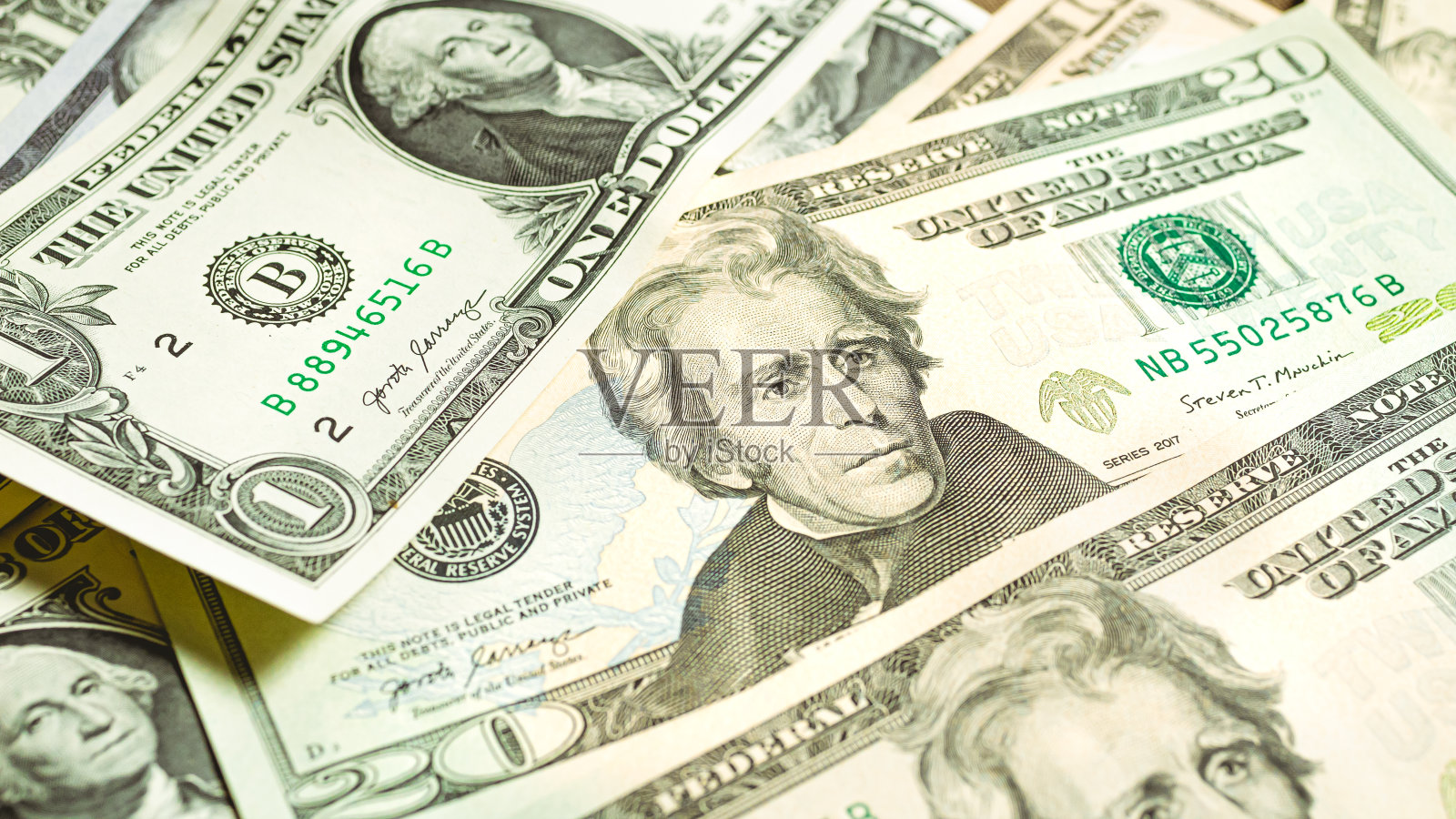 货币，美元纸币背景。美元钞票的特写。摄影为金融，经济和货币交换概念。照片摄影图片