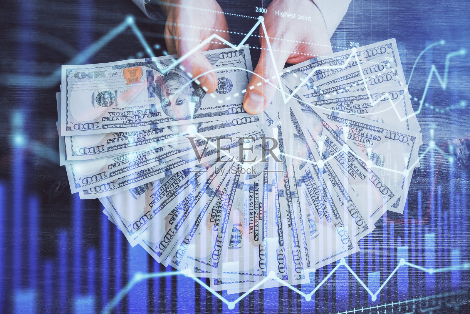多次曝光金融图形绘图全息图和美元钞票和人的手。分析的概念。照片摄影图片