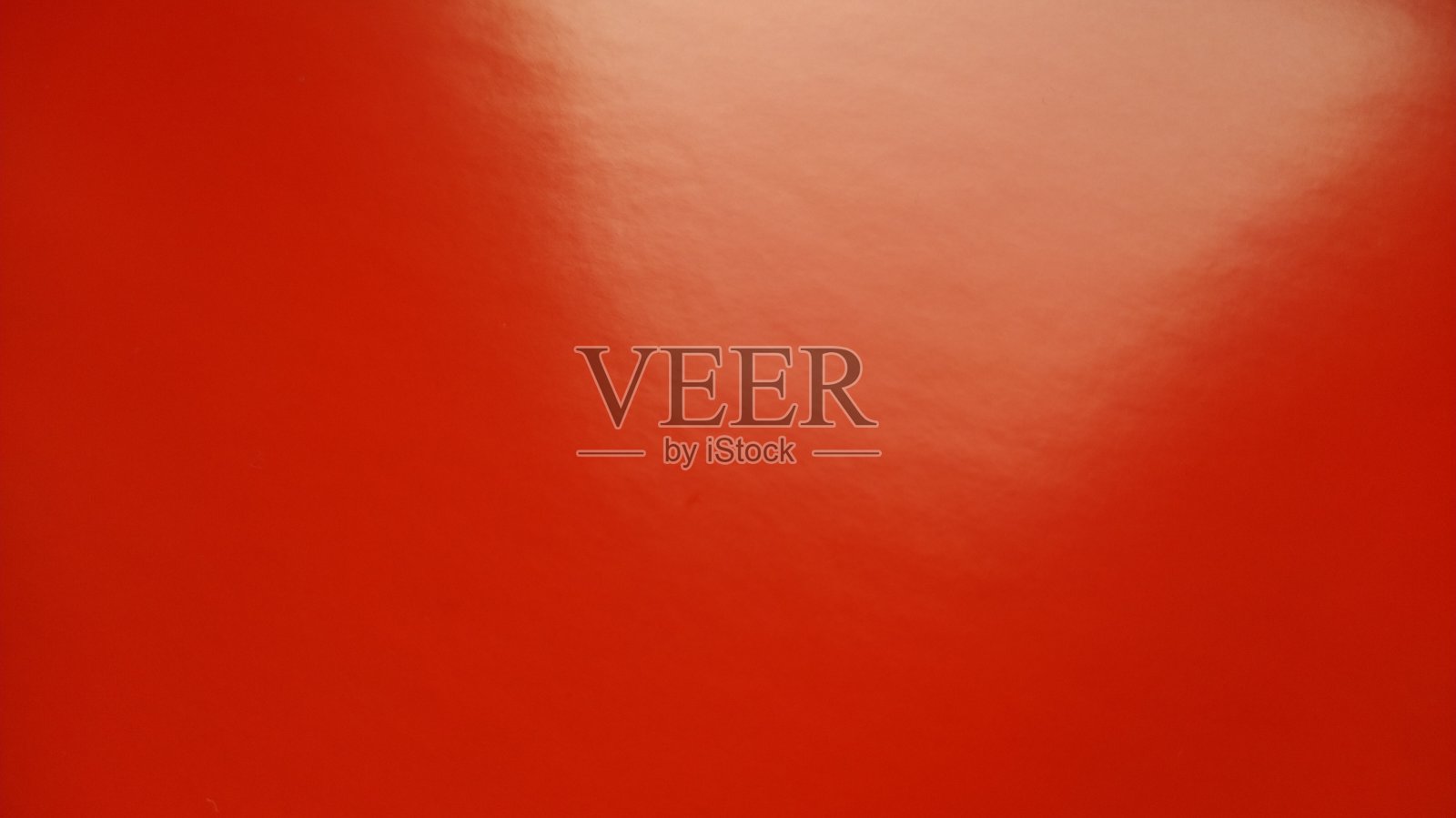 红色或猩红色背景与灯光梯度。明亮的颜色。彩色纸靠近。本空间照片摄影图片