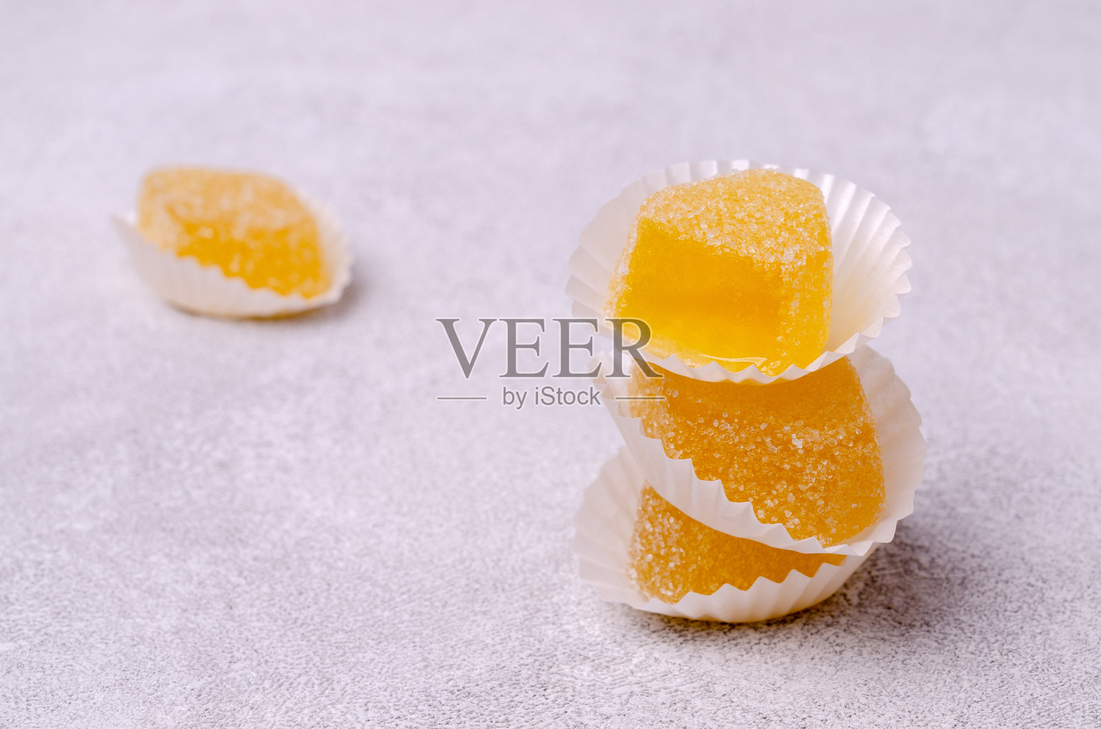 黄色的果冻糖果。照片摄影图片