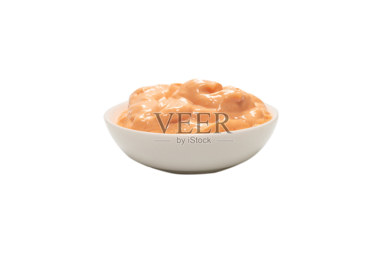 酱汁在碗里孤立白色。照片摄影图片