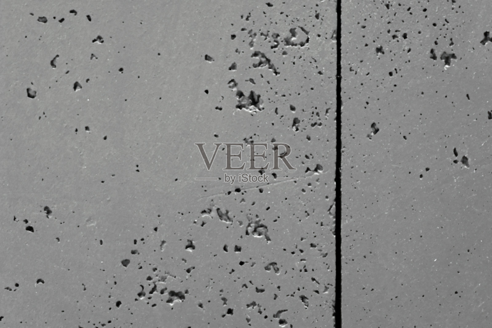 深色的石墨立面，墙壁，瓷砖，石器，粗糙的垃圾，风化的纹理表面特写照片摄影图片