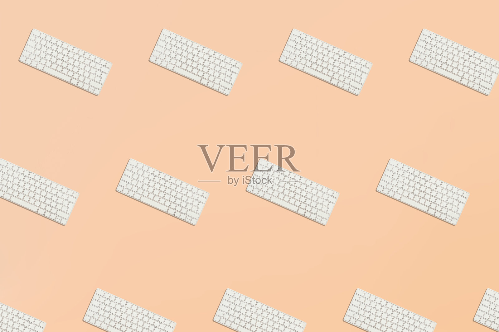 无缝模式从键盘在粉红色的背景平衡照片摄影图片