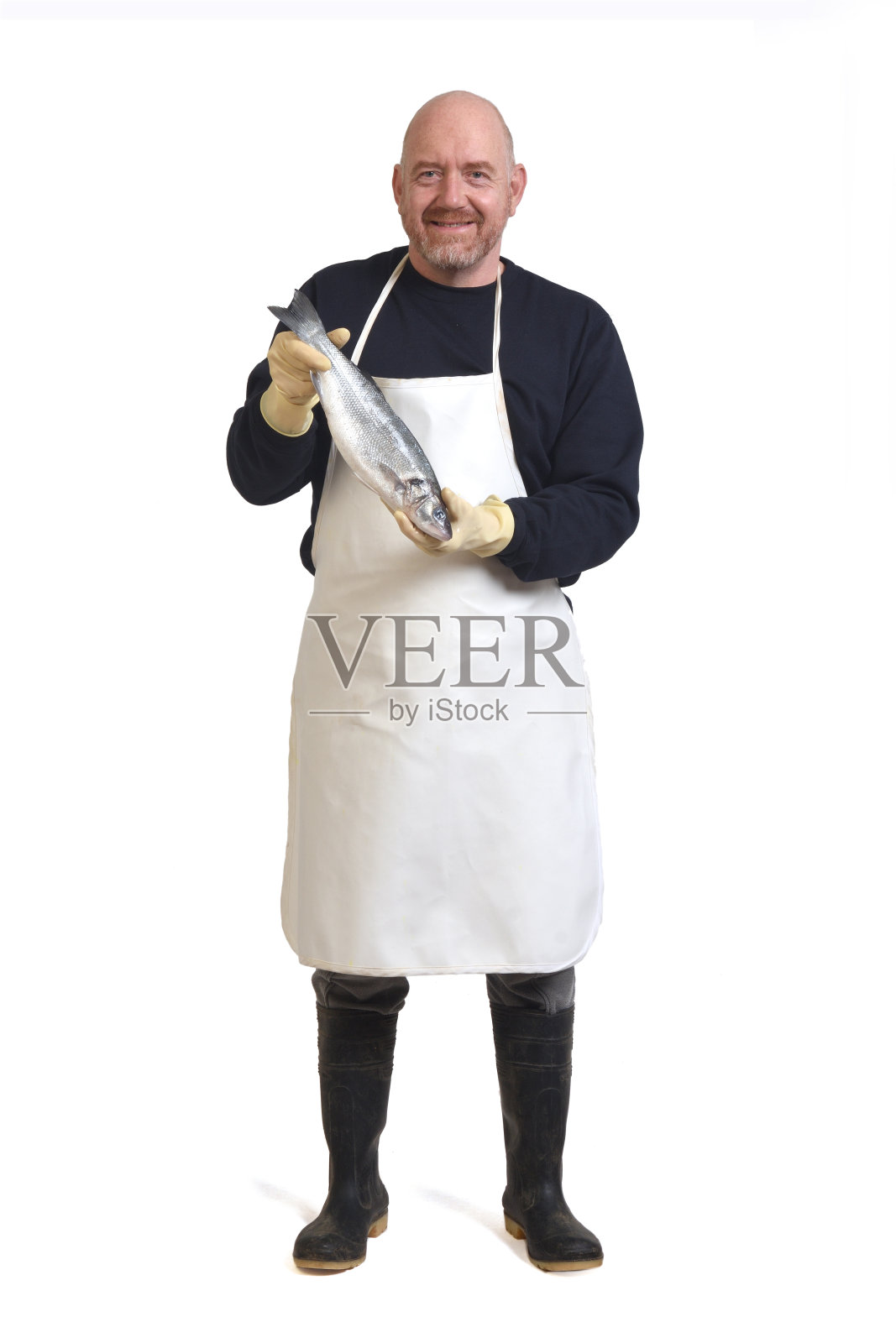 一个鱼贩的肖像在白色的背景照片摄影图片