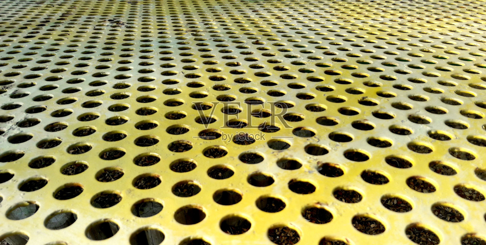 黄色金属网格，背景和纹理，特写照片摄影图片