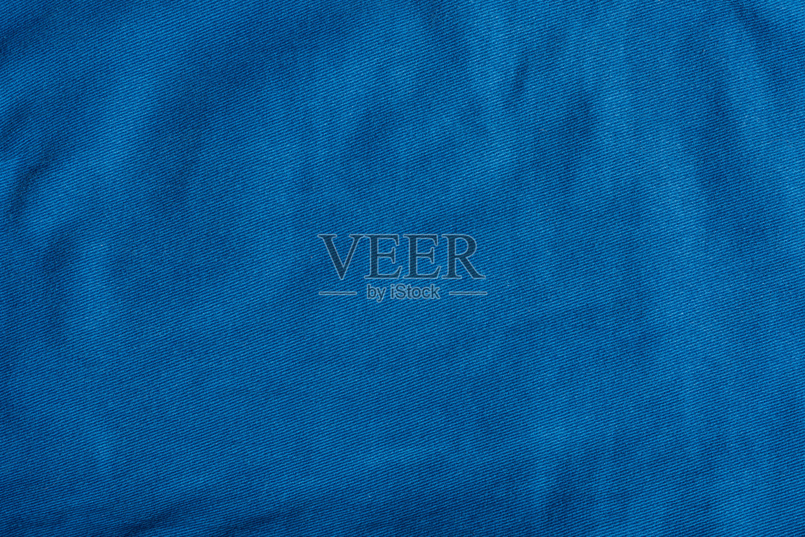 近距离照片的蓝色布纹理照片摄影图片