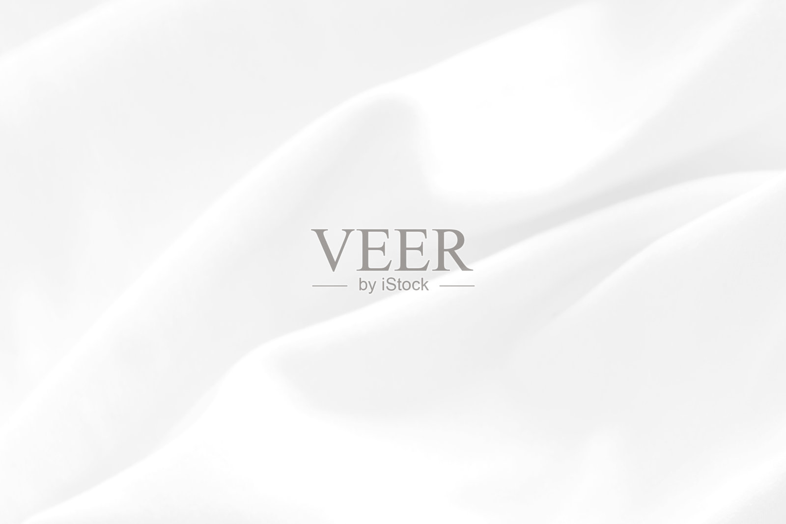 白色干净柔软的织物抽象光滑的美丽纹理。时尚纺织自由造型装饰背景照片摄影图片