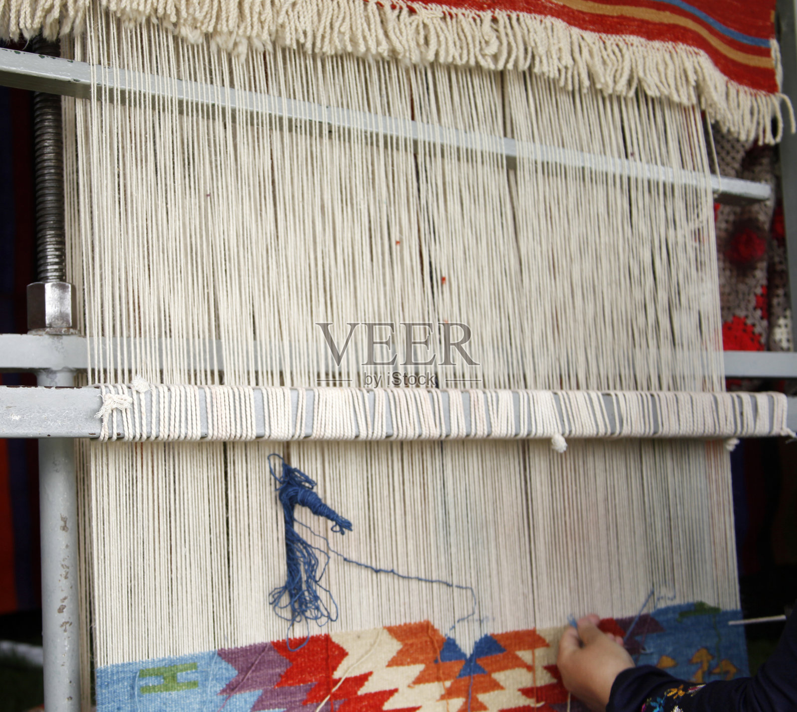 地毯编织。原来土耳其模式。照片摄影图片