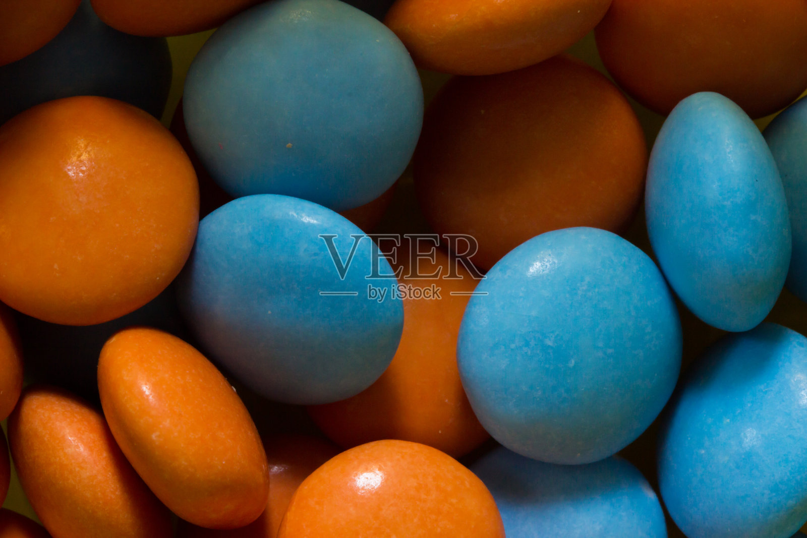 彩色的糖果和糖果的特写。彩色巧克力甜点照片摄影图片