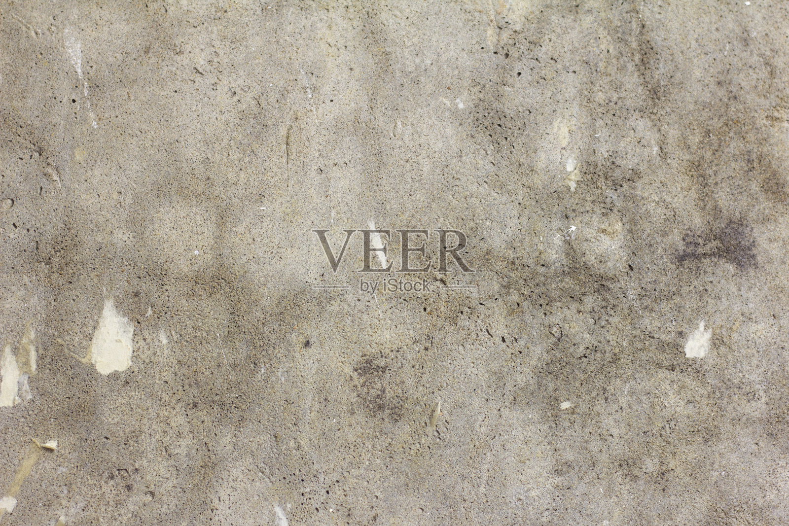 混凝土墙。抽象的纹理混凝土灰色背景。墙纸的裂缝和残余物。修理公寓或办公室。照片摄影图片