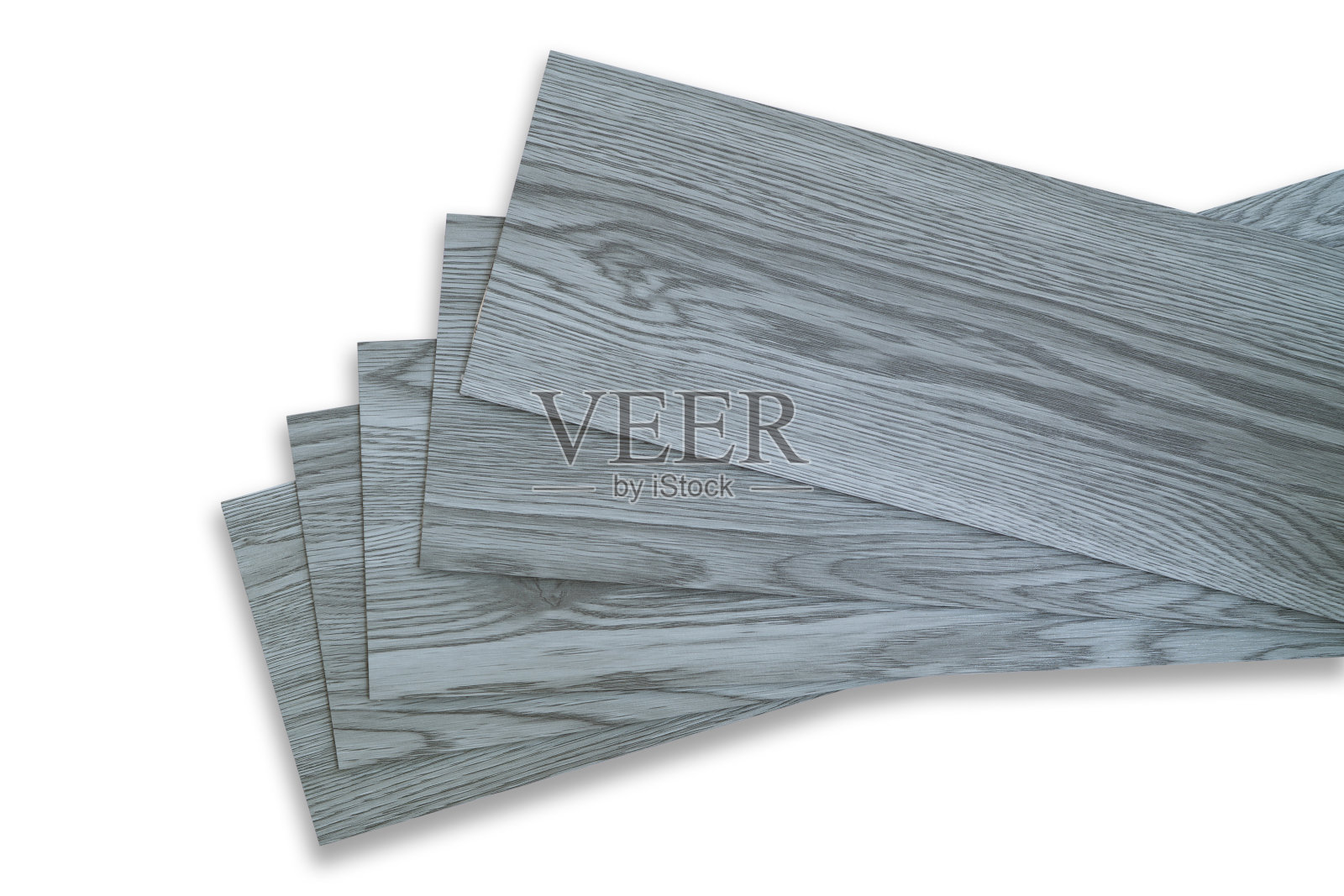 用于住宅装修室内设计的乙烯基瓷砖。新型木纹乙烯基瓷砖。乙烯地板材料。用于新家庭地板的聚合物乙烯基板。PVC材料隔离在白色背景上。照片摄影图片