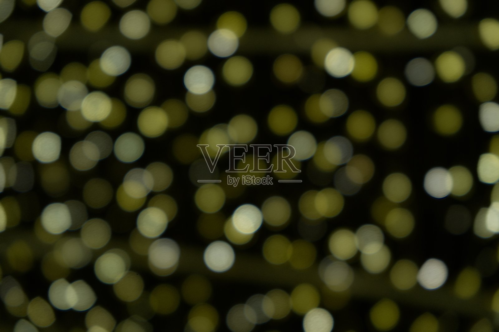 模糊光圈散景抽象背景。照片摄影图片