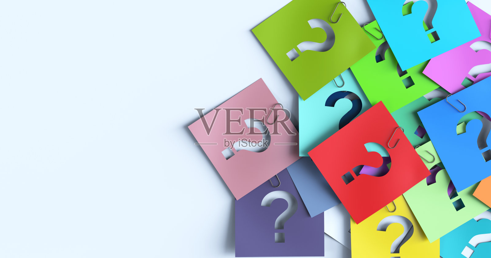 彩色纸上的问号照片摄影图片