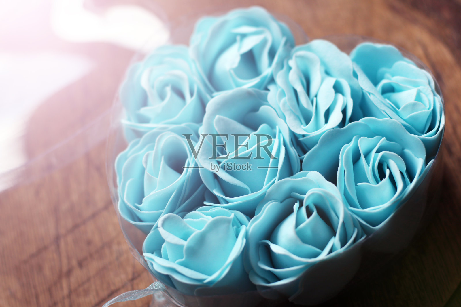 蓝色花朵形状的肥皂照片摄影图片