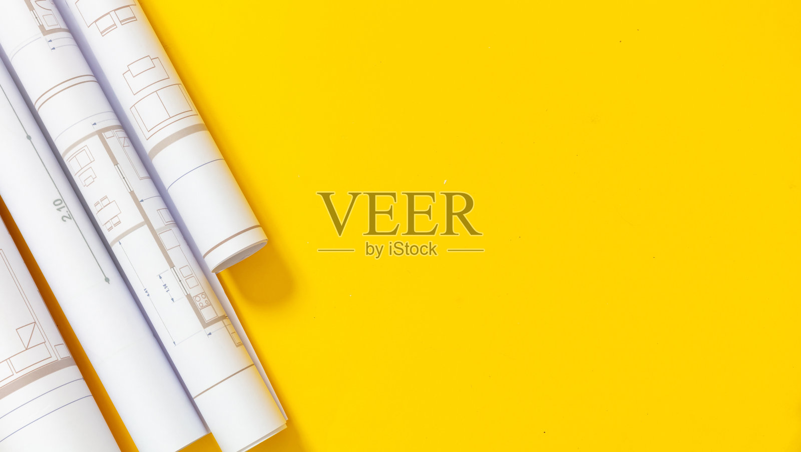 建筑工程图纸概念。建筑蓝图以黄色为背景，复制空间照片摄影图片