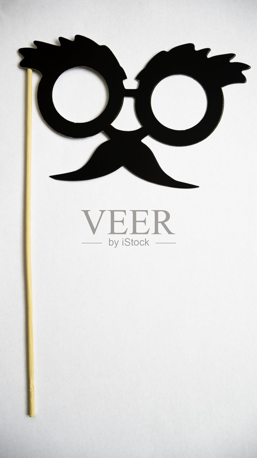 胡子和眼镜幽默面具胡子眼镜眉毛上的一根棍子。照片摄影图片