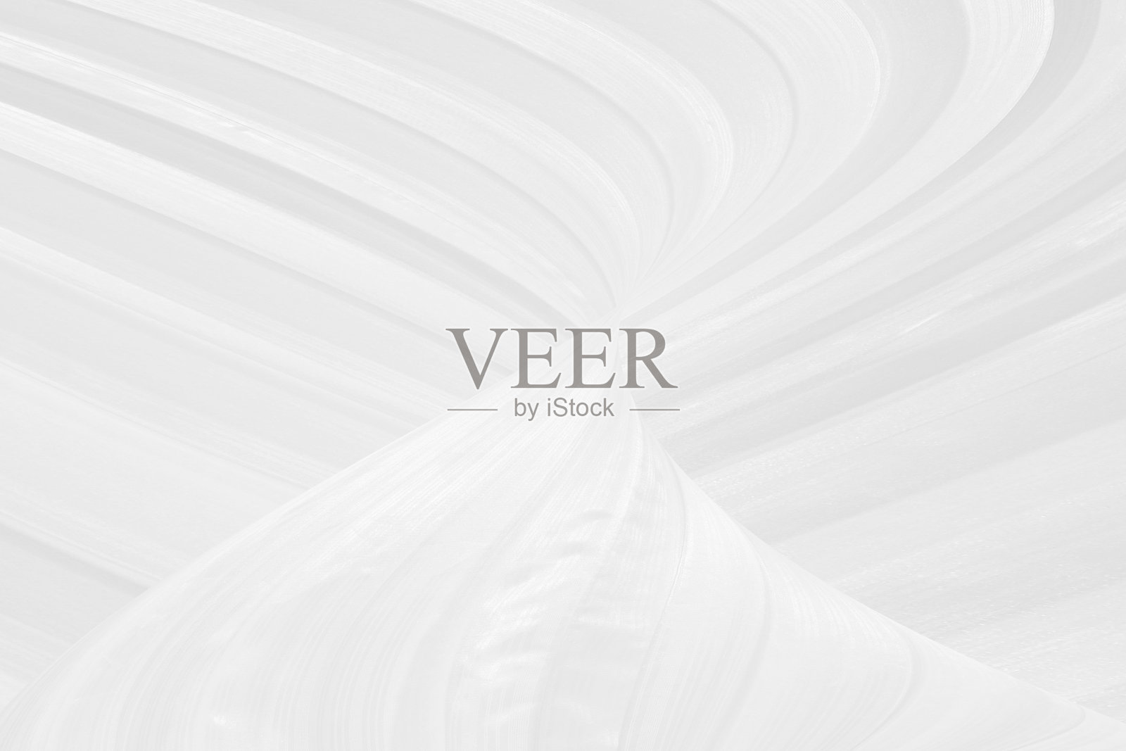 柔软的织物，干净的编织，美丽的抽象光滑的曲线形状，装饰时尚的纺织品白色背景照片摄影图片