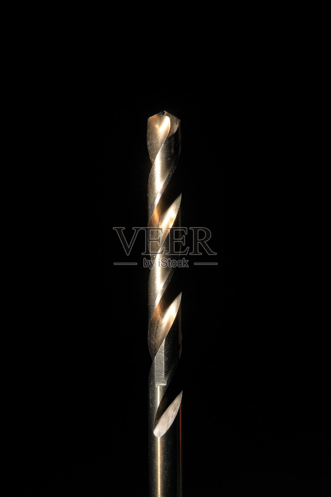 特写钴钢钻头与黑色背景照片摄影图片