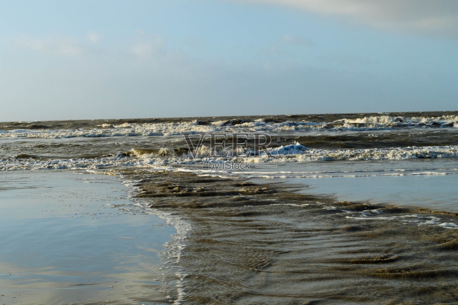 北海海岸的潮汐照片摄影图片