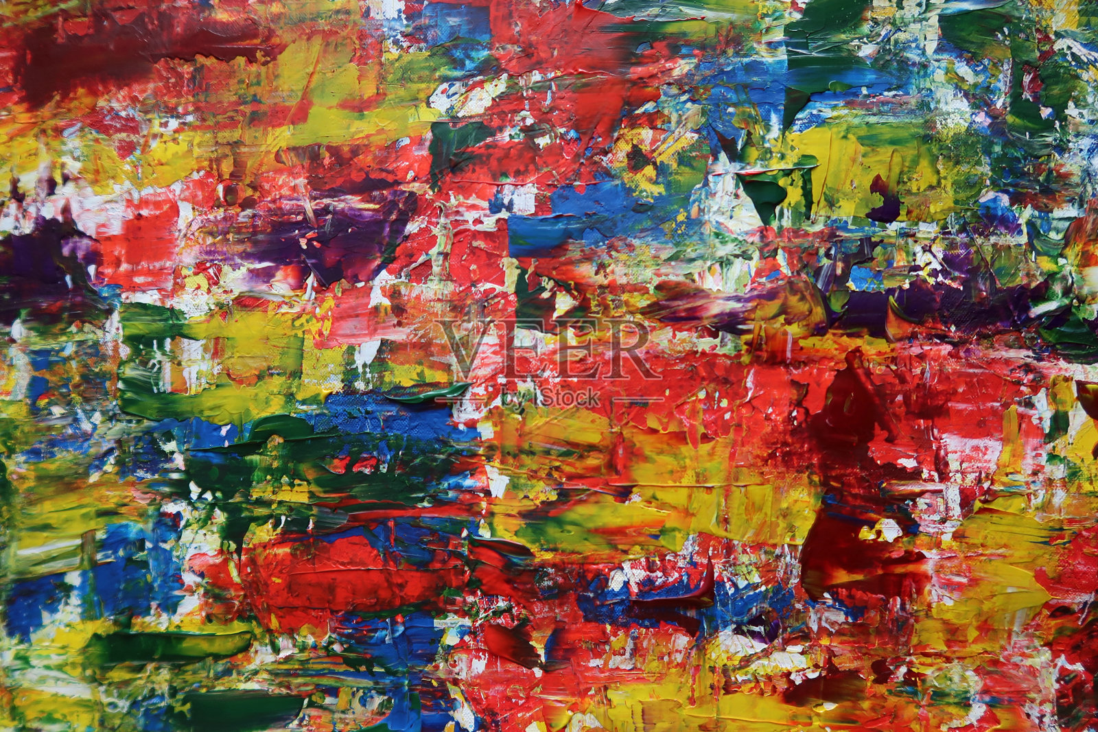 背景抽象纹理和图案。在画布上随机涂上多种颜色的颜料照片摄影图片