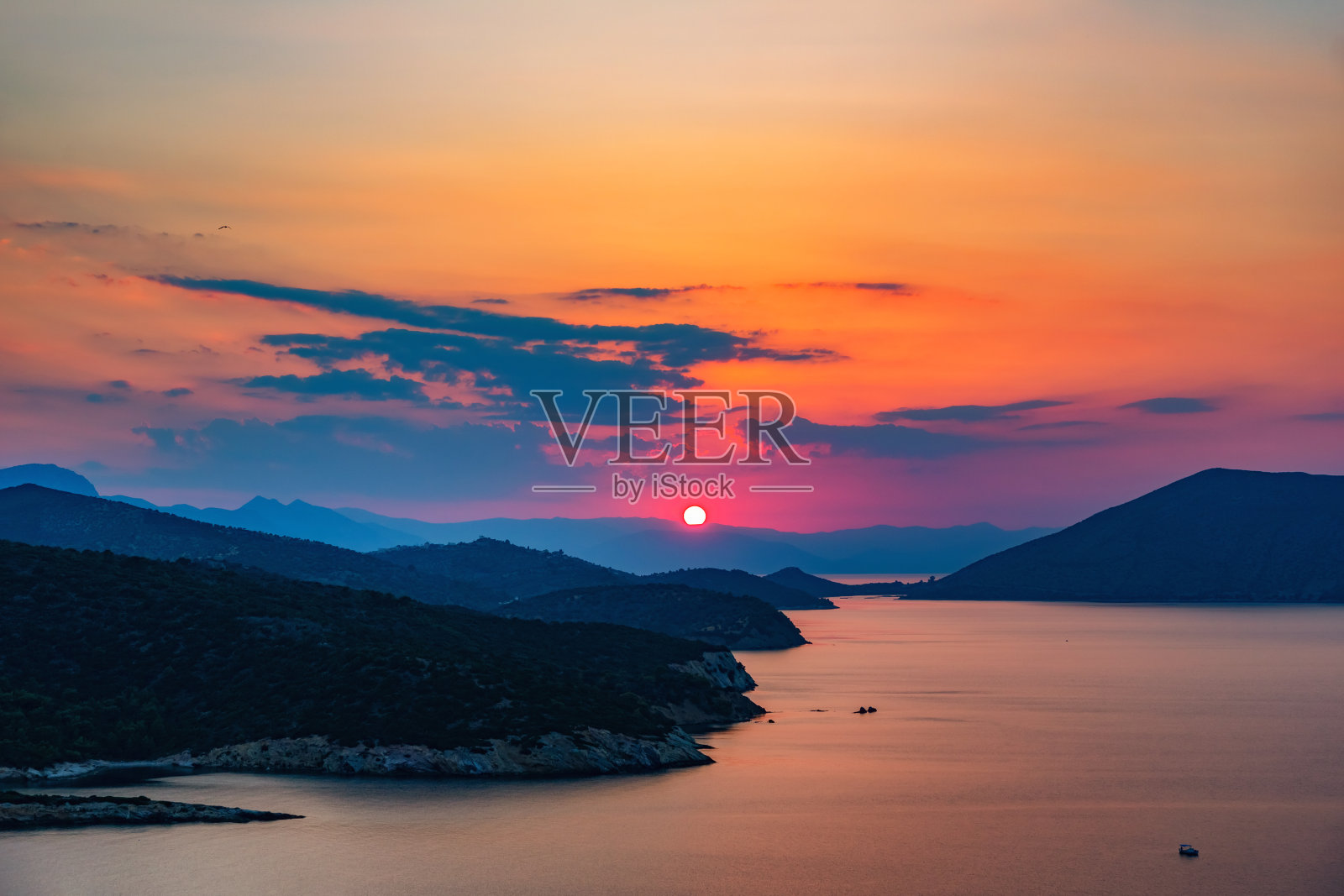 希腊海面上的日落照片摄影图片