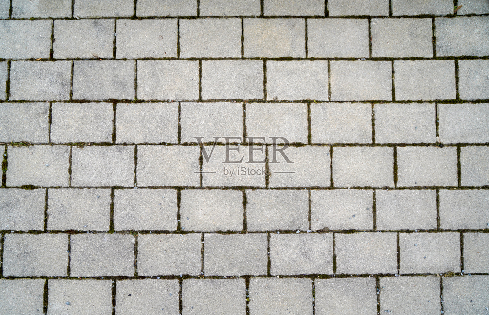 由天然石头建造和灌浆的墙照片摄影图片