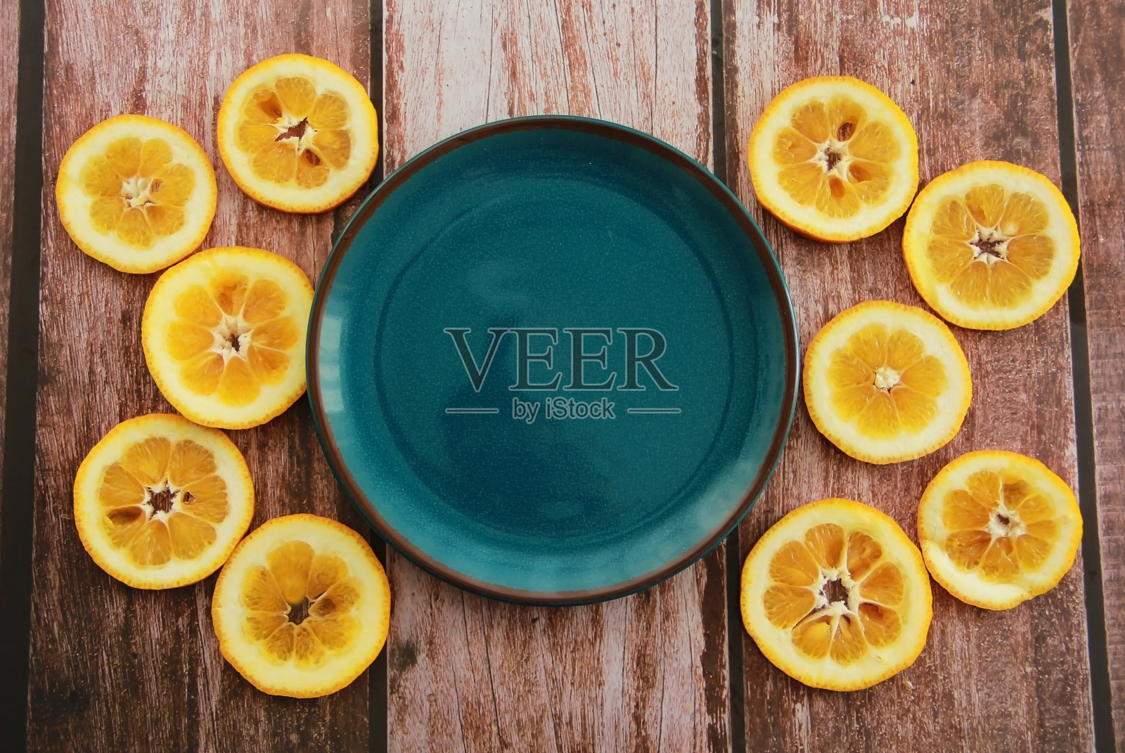 橙色的圆片和蓝色的装饰板照片摄影图片