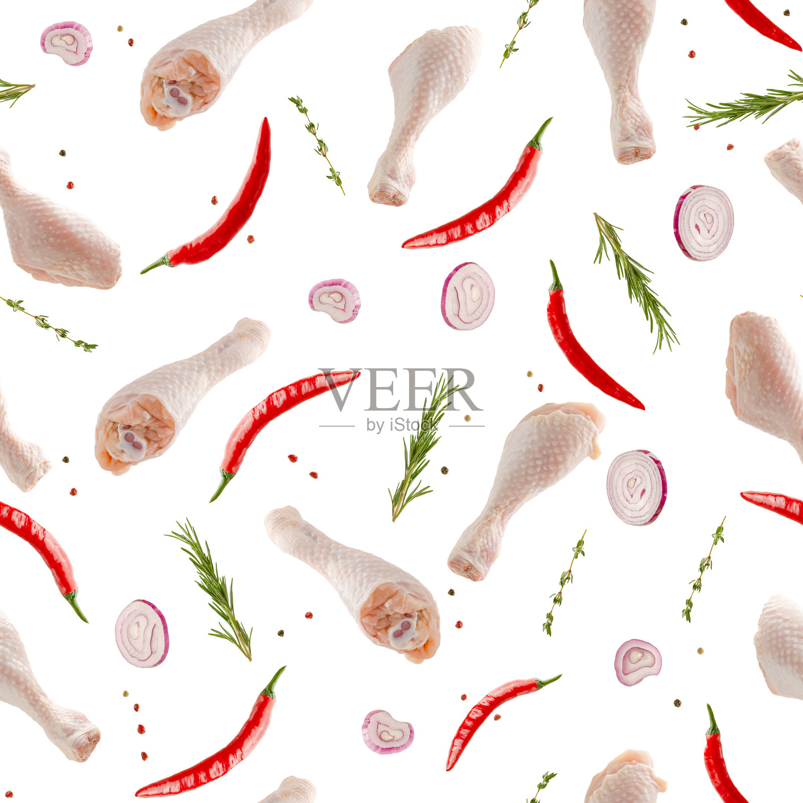 飞行生鸡腿与香料照片摄影图片