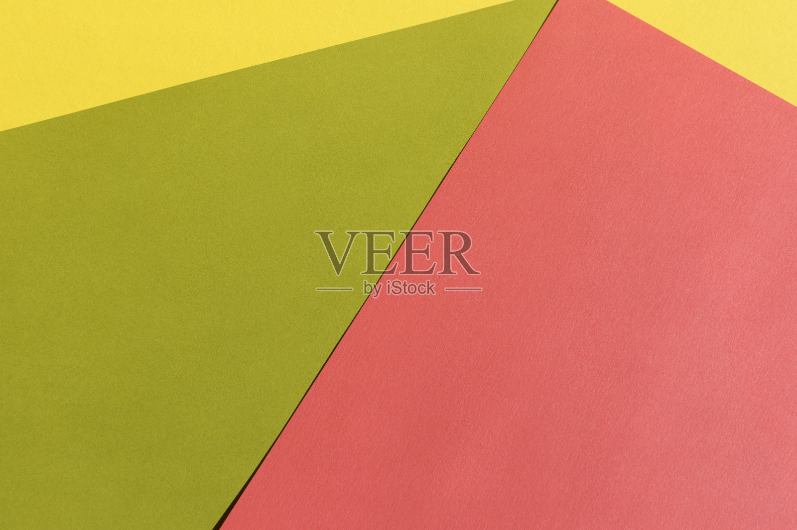 抽象亮绿色、粉红色和黄色的纸纹理。几何形状和线条。照片摄影图片