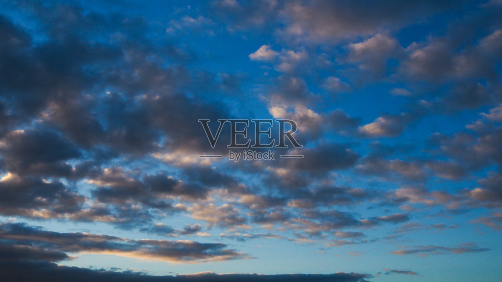 日落云之间照片摄影图片