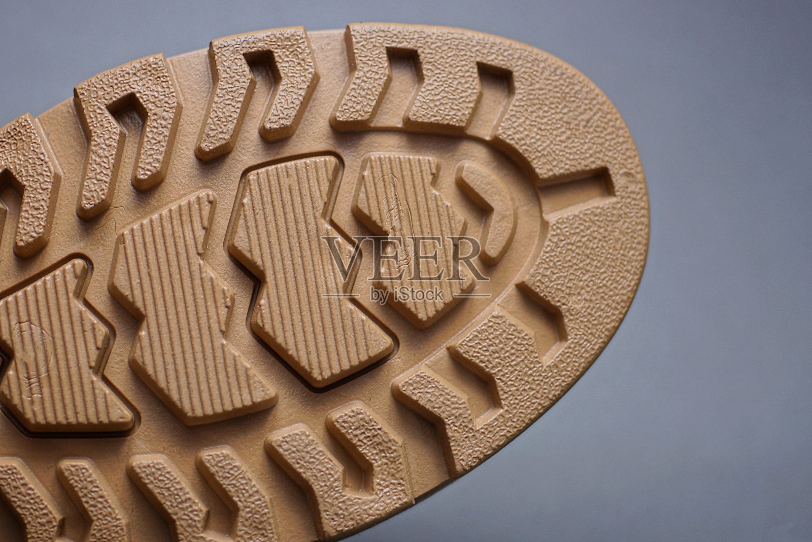 有橡胶底的靴子的一部分照片摄影图片